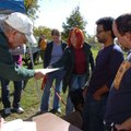 Nicole Ryan, center, accepts a volunteer appreciation award from Richard Clehouse, left,  volunteer ...