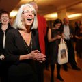 Louise Schaper, retiring executive director of the Fayetteville Public Library, laughs during a rece...