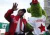 Philadelphia Mayor Michael Nutter dances with the Philadelphia Phillies’ mascot, the Phillie Phanatic, during a rally for the team at City Hall in Philadelphia on Monday.