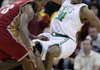 Boston’s Paul Pierce (34) draws a charging foul on Cleveland’s LeBron James in the fourth quarter of the Celtics’ 95-89 victory on Tuesday in Cleveland. Pierce led the Celtics with 23 points, while James led the Cavaliers with a game-high 38 points.