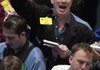 Oil traders work in the options pit on the floor of the New York Mercantile Exchange on Wednesday.