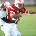 Ramay Junior High running back Brice Gahagans, right, is tackled after a big gain by George Junior H...