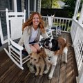 Denise Holmes and her dogs Henri and Chelsea sit on her friends porch in Fayetteville, her favorite ...