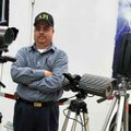 Surrounded by different night-vision cameras, Alan Silva, who heads up Arkansas Paranormal Investiga...
