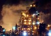 FILE — Steam floats over part of the BP oil refinery plant in Texas City, Texas, two days after a blast March 23, 2005, killed 15 people.