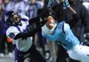 Fayetteville senior receiver Quentin Smith (49) reaches for a pass as Har-Ber senior cornerback Katraius Lane defends during the second quarter of the Dogs’ 39-14 loss Friday at Jarrell Williams Bulldog Stadium in Springdale. 