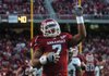 Arkansas running back Knile Davis strolls to the end zone to score the Razorbacks' first touchdown in the first quarter of their 63-27 win Saturday in Fayetteville.