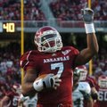 Arkansas running back Knile Davis strolls to the end zone to score the Razorbacks' first touchdown i...