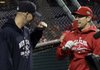 Arkansans A.J. Burnett (left) of the New York Yankees and Cliff Lee of the Philadelphia Phillies will face off as starting pitchers tonight.