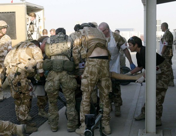 a-casualty-is-brought-into-the-military-hospital-at-camp-bastion-in-helmand-province-afghanistan-after-five-british-soldiers-were-killed-in-an-attack