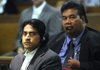 Weston Ludrick, left, looks at the jury Tuesday while Pete Joel interprets. Ludrick, 31, is charged with negligent homicide in the death of Miguel Guadarrama-Nava, 66, following a four-vehicle accident on Old Wire Road, just south of Emma Avenue shortly before Christmas. Ludrick is a native of a Micronesian island, Pohnpei, and speaks an obscure South Pacific island dialect. Joel is a native of Pohnpei and fluent in the dialect.