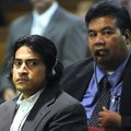 Weston Ludrick, left, looks at the jury Tuesday while Pete Joel interprets. Ludrick, 31, is charged ...