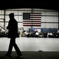 Col. Robert Britton walks into an airplane hangar Tuesday to a change of command ceremony where Lt. ...