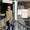 Pat LaPerre of Rogers walks out of the Prairie Creek Marina on Tuesday. The Little Rock District of ...