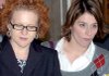 Kristen Edwards (left), a Marianna rape victim, and Little Rock Police Crime Scene investigator Megan Sawchuk, witnesses in Curtis Lavelle Vance’s trial, leave the courtroom Thursday.