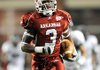 Arkansas wide receiver Joe Adams races for the end zone for a touchdown during the third quarter Saturday in Reynolds Razorback Stadium in Fayetteville.
