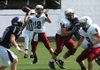 Springdale High’s Joseph Calcagni looks to pass against Fayetteville on Oct. 3 in Fayetteville.
