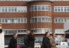 Opel employees enter the auto plant in Bochum, western Germany, on Wednesday. General Motors Co. announced Tuesday that it had decided not to sell Opel.