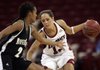 Arkansas' Julie Inman is guarded by Northeastern State's Jasmine Wright Wednesday