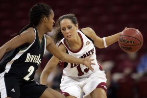 Arkansas' Julie Inman is guarded by Northeastern State's Jasmine Wright Wednesday