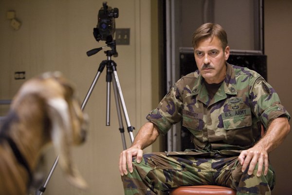 psychic-warrior-lyn-cassady-george-clooney-attempts-to-do-some-serious-damage-to-a-helpless-caprine-subject-in-the-military-farce-the-men-who-stare-at-goats
