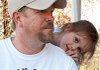 IC Corp. worker Bill Traffanstedt, 39, and his granddaughter, Ivy Sutterfield, 6, sit on the porch of their Atkins home Friday. Traffanstedt has worked at the Conway bus plant for 18 years.