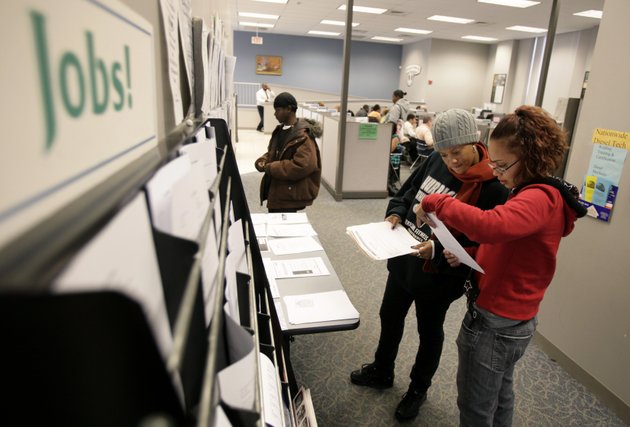 jahaira-perez-right-and-takela-lawrence-both-of-providence-ri-examine-job-listings-at-a-state-managed-employment-center-perez-is-unemployed-after-being-laid-off-in-may-from-her-job-as-a-cashier-at-a-supermarket-while-lawrence-is-looking-for-a-second-job-as-a-school-crossing-guard