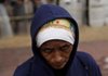 A woman attends a protest Thursday in Tegucigalpa, Honduras, demanding that Honduras’ ousted President Manuel Zelaya be returned to power.