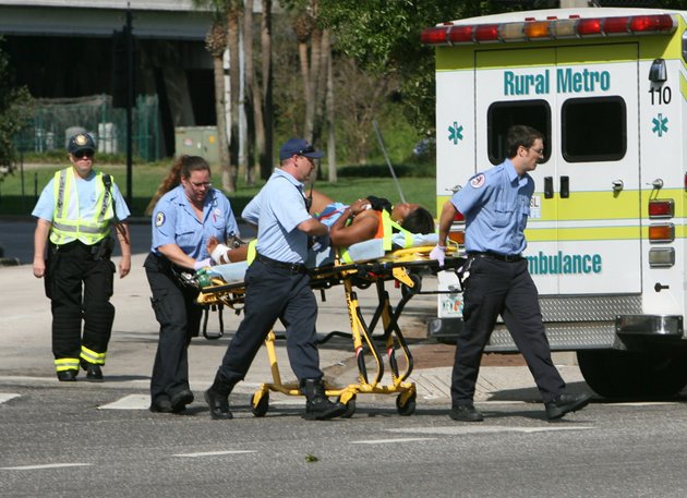 emergency-workers-transport-a-victim-from-a-shooting-in-downtown-orlando-on-friday