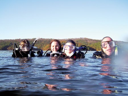 chris-johnson-from-left-misty-brown-and-wanda-and-keith-admire-are-all-smiles-at-the-waters-surface