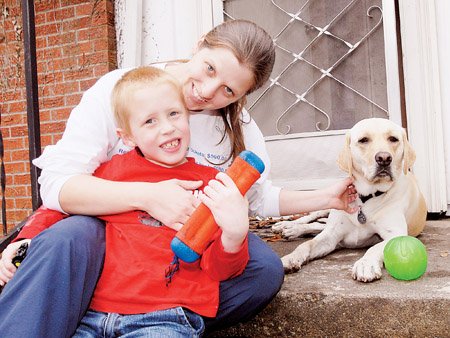 christy-etters-her-6-year-old-son-jackson-and-his-dog-chester-take-a-break-on-the-steps-of-their-home-in-conway-the-autism-service-dog-which-cost-13500-was-purchased-in-oregon-a-conway-man-whose-son-also-is-autistic-helped-lead-fundraising-efforts