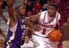 Brandon Mitchell, shown in 2009 against LeMoyne-Owen, gave up basketball to concentrate on football, but the Razorbacks’ backup quarterback decided to try basketball again after playing with old teammates and friends in Amite, La., following Arkansas’ victory in the Cotton Bowl. 
