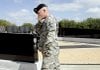 A soldier pauses Saturday at Fort Hood, Texas, at a memorial for servicemen killed in foreign wars.