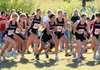 The Bentonville girls team gears up at the track meet.