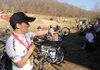 Salvador Vazquez, who has a disability, describes his first-place win Saturday in the short track competition with a bicycle designed for control with one arm at the Slaughter Pen Jam in Bentonville.