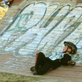 Keegan Stinespring relaxes Saturday after competing in his first bicycle race at the Slaughter Pen J...
