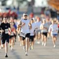 Frank Arellano, center, of Rogers leads the pack Saturday at the start of the Veterans Memorial 5K R...