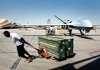 Bombs are hauled away from a Reaper unmanned aircraft in Kandahar, Afghanistan, in this file photo.
