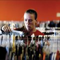 April Emerson of Rogers looks through clothes offered Saturday by the “Clothes Line” giveaway of Ser...