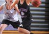 Fayetteville junior point guard Calli Berna, right, drives past junior guard Clair Childers during practice Thursday in Fayetteville.