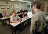 Springdale Detective Mark Smith conducts a training class for rookies Monday at the Springdale police station.
