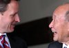 Timothy Geithner, U.S. treasury secretary, left, is welcomed by Hirohisa Fujii, Japan's finance minister, as he arrives at Fukudaya, a Japanese restaurant, for a dinner meeting in Tokyo, Japan