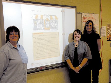 bismark-middle-school-teachers-kathy-pasley-from-left-misti-mcanally-and-summer-calhoun-use-technology-such-as-the-smart-board-in-their-classrooms-everyday
