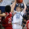 Springdale Har-Ber’s Chris Bayles shoots over a Stilwell, Okla., player Tuesday in Springdale.