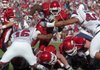 University of Arkansas running back Broderick Green pushes his way into the end zone to score a touchdown in the third quarter of Saturday afternoon's game at Razorback Stadium in Fayetteville.