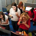 Elyse Quattlebaum, 16, left, Claire Poteet, 17, and Macy Callahan, 17, put on makeup Wednesday befor...