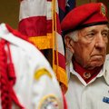George Brannon of the Bella Vista Veterans of Foreign Wars Post 9063 prepares to post the colors Wed...