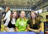 Springdale Har-Ber athletes from left, Sydney Marsellis, Halee Castleman, and Katie Collins smile during a signing ceremony Wednesday in Springdale.