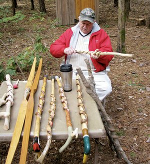 Woodcarver Bob Johnson of Fairfield Bay whittled away, displaying beautiful walking sticks.