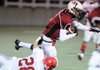 Springdale High senior receiver Justin Bocchino runs for extra yards after making a catch against Fort Smith Northside on Oct. 16.
